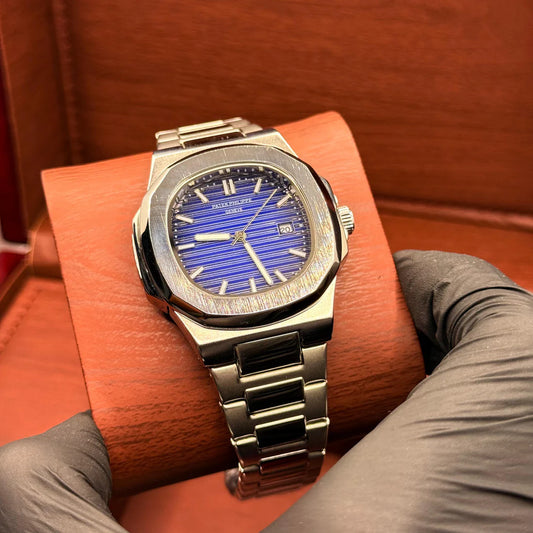 Patek Phillipe silver with blue dial with date